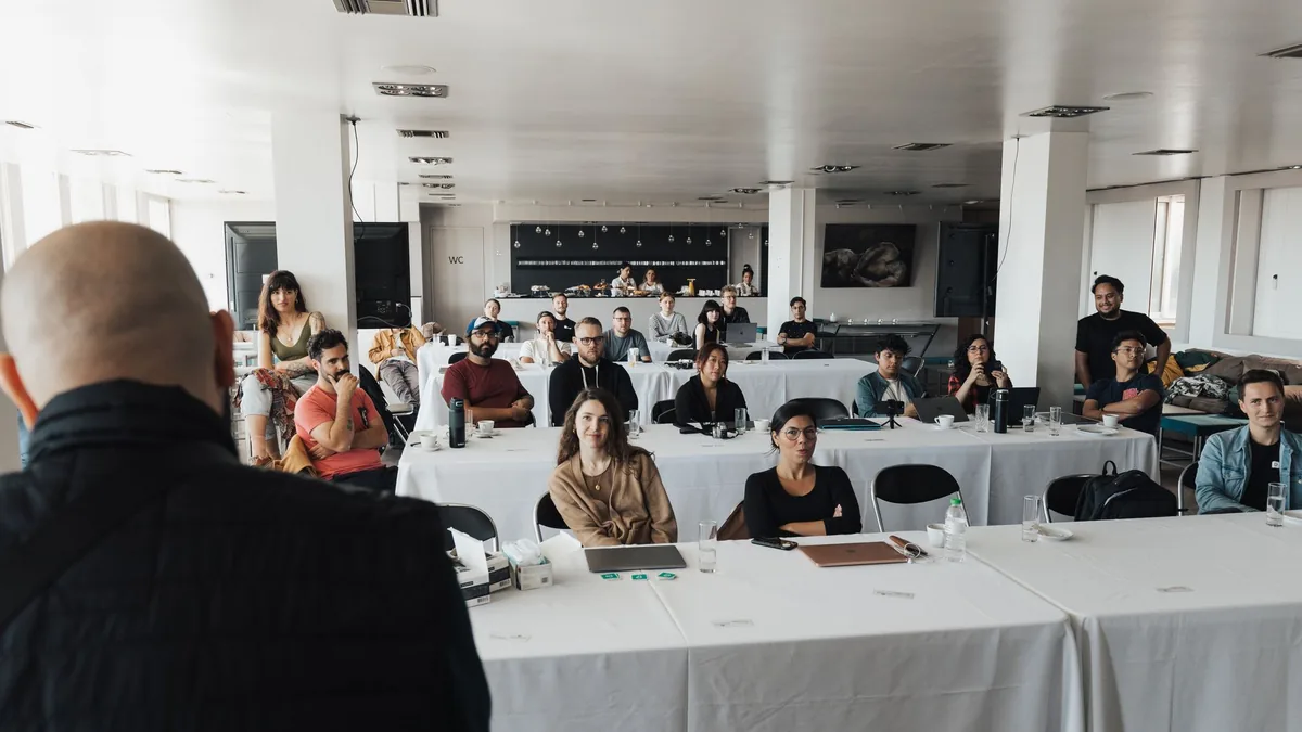 Group of staff attending a training session in a conference room